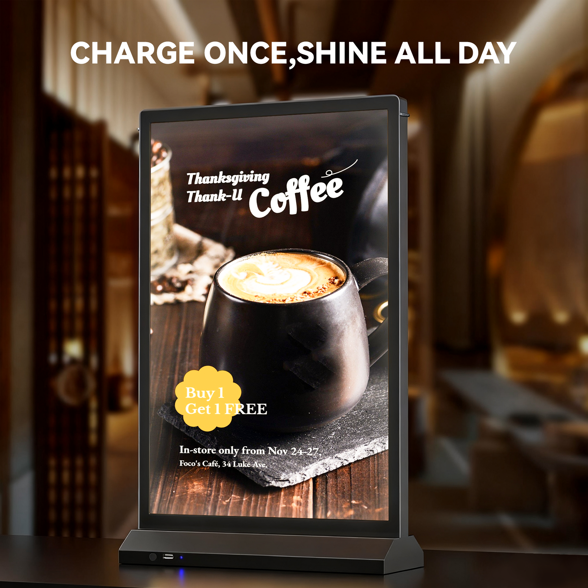 close-up of black rechargeable desktop LED light box with poster inside