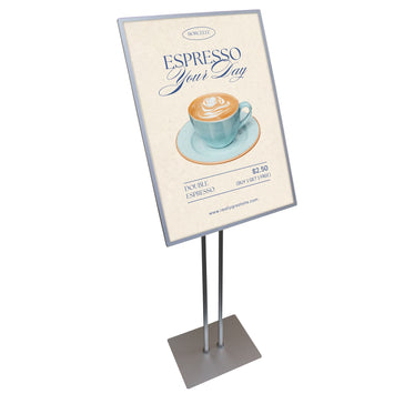 A vertical poster advertising light box sign with a double pole stand, displaying an espresso related advertisement.